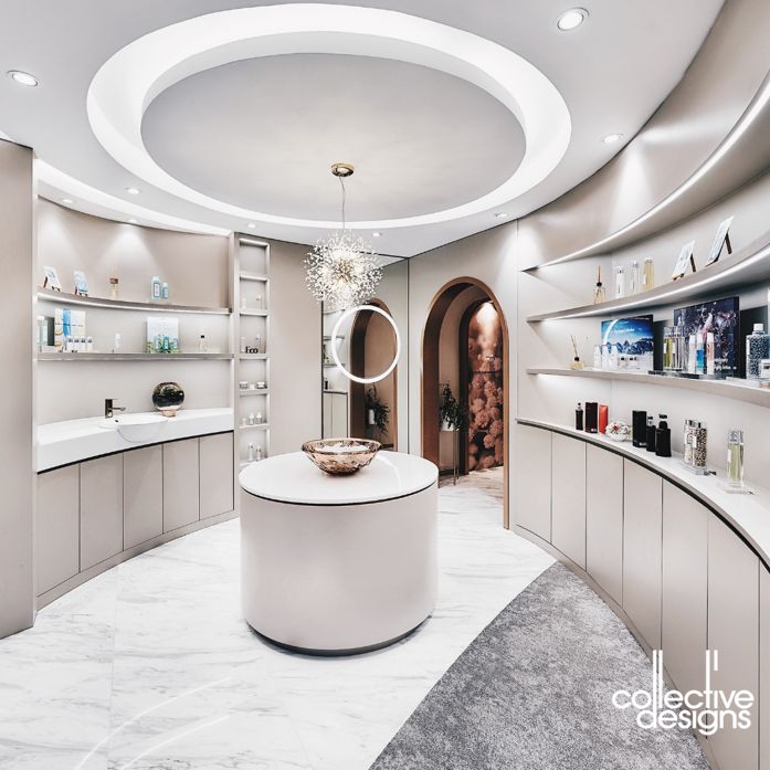 A bathroom with a circular counter and shelves.