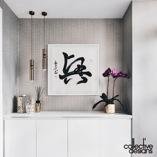 Chinese calligraphy on a white cabinet.